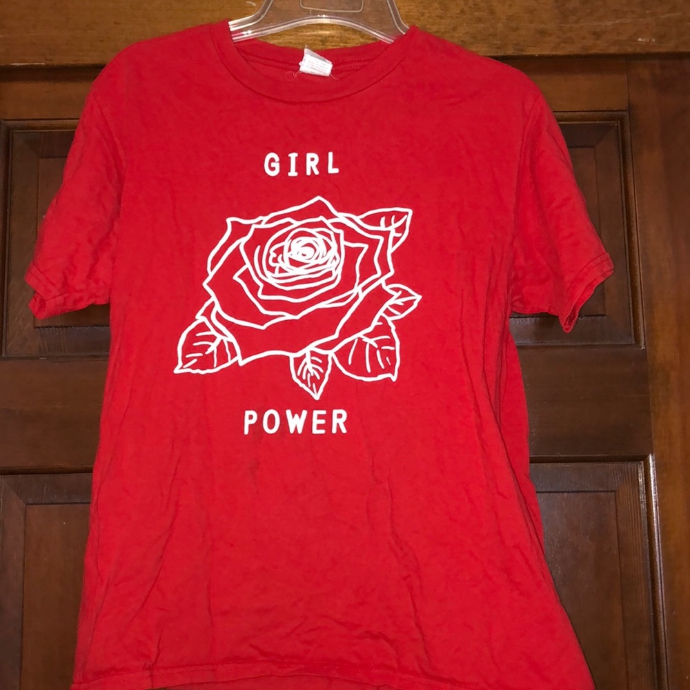 Red t-shirt with white lettering.